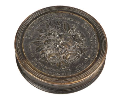 * Snuff Box. 19th century pressed horn snuff box, the cover with cupid and a bee within roses surrounded by a verse signed W.