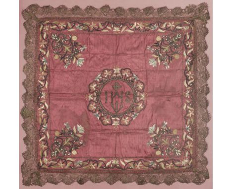 * Chalice Veil. An embroidered and metalwork chalice veil, 17th century, with central initials 'IHS' and sunburst cross worke