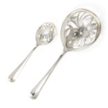 Christa Ehrlich wet fruit scoop and pickle spoon, model 1064, Voorschoten 1930, silver