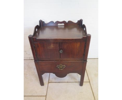 A Georgian mahogany tray top commode with two doors above a pullout base - 80cm tall 60cm x 47cm 