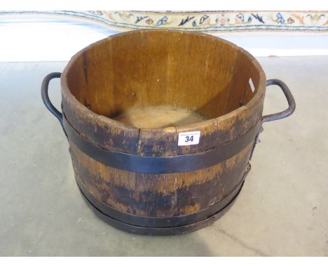 A small 19th Century barrel-type planter, metal bound with iron carrying handles - Historic woodworm treated - oiled finish -