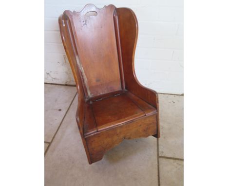 A 19th Century mahogany childs rocking chair commode - 66cm H x 38cm 