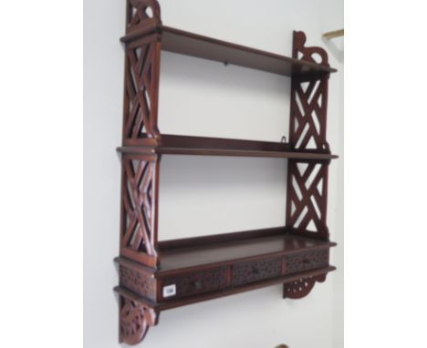 A Georgian style mahogany waterfall wall shelf with three small drawers, 90cm H x 66cm W x 19cm D 
