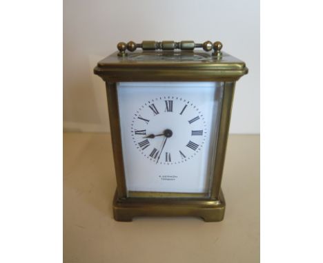 A brass carriage clock, the dial signed E Sermon Torquay, clean condition, ticks but stops 