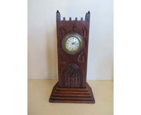 A Gothic style oak mantle clock - 33cm H, running in sale room, clean condition 