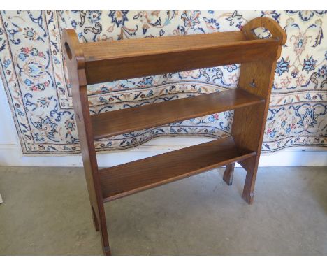 An Arts and Crafts oak three tier book case/book trough - 88cm H x 76cm x 22cm 