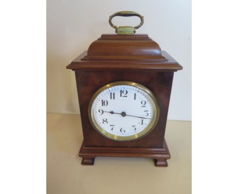 A mahogany carriage style mantle clock, 22cm tall, clean condition, running in sale room 