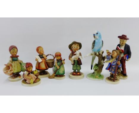 Six Hummel figures, a continental pottery figure of a gentleman reading and a Royal Belvedere bird figure, (8) 