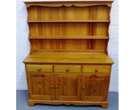 Ercol pine kitchen dresser, with shelved back over three short drawers and three cupboard doors, 168 x 135cm