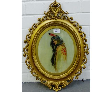 Oval portrait of a 'Girl with Feather Headdress'  Oil-on-Canvas,  apparently unsigned,  contained within an ornate giltwood f