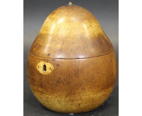 A George III fruitwood tea caddy of pear form, 14 cm high CONDITION REPORTS The stalk of the pear is broken off and missing. 