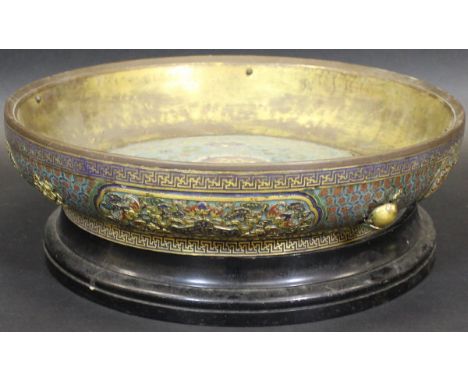 A 19th Century Chinese cloisonne and champleve panel decorated circular bowl, raised on a circular foot with associated eboni