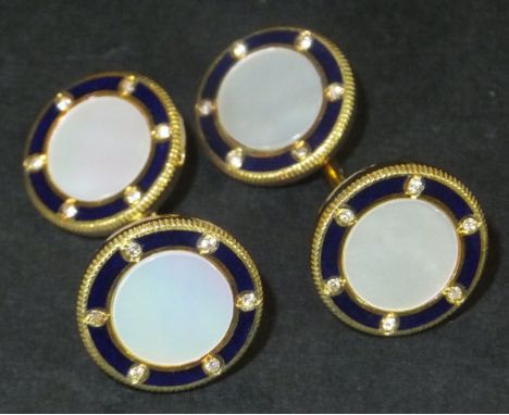A pair of 18ct gold, mother of pearl, diamond and blue enamel decorated circular cufflinks, 14.6g CONDITION REPORTS Have some