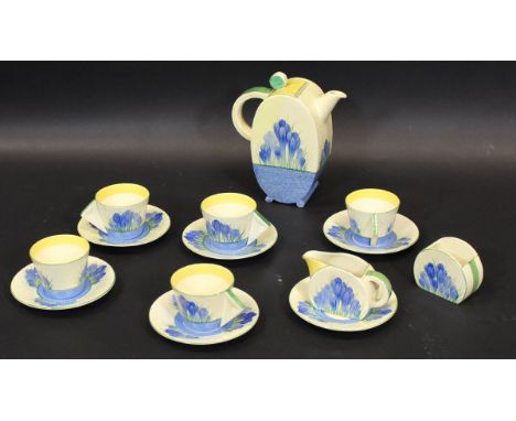 A Clarice Cliff "Bizarre" pattern coffee set with blue crocus pattern comprising coffee pot, cream jug, sugar bowl, five cups