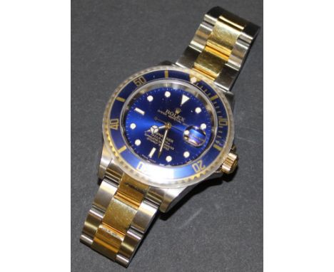 A steel and gold cased Rolex Oyster Perpetual Date Submariner Superlative Chronometer gentleman's wristwatch with blued face 