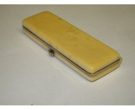 An early 19th Century carved ivory rectangular box with gold mounts, the hinged lid opening to reveal a velvet-lined interior