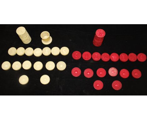 A 19th Century Cantonese export ware carved ivory and red-stained chess / draughts set of counter form with two dice shakers 