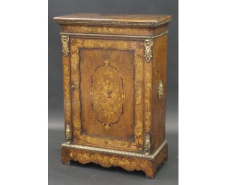 A Victorian burr walnut and marquetry inlaid single door side cabinet enclosing two shelves, the top with applied moulded edg