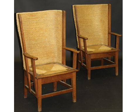 A pair of late 19th / early 20th Century oak framed Orkney chairs with seagrass back and rush seat CONDITION REPORTS Approx 1