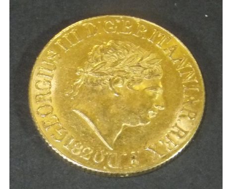 A George III gold sovereign, dated 1820 CONDITION REPORTS Basically in good condition although with light scratching to the s