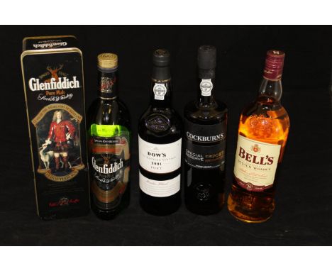 A mixed lot containing one bottle Glenfiddich Special Old Reserve Pure Malt Whisky in Clan Sutherland Clans of The Highlands 