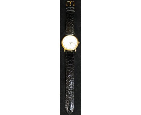 An 18ct gold cased Patek Philippe Calatrava gentleman's wristwatch with original leather strap and gold buckle, together with