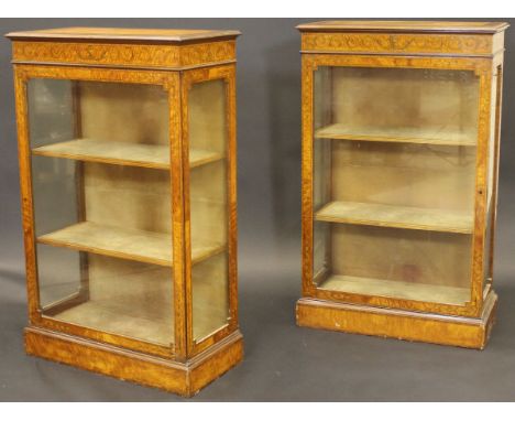 A pair of Edwardian Sheraton Revival satinwood and marquetry inlaid display cabinets, the crossbanded marquetry inlaid top ab