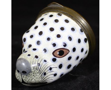 A late 18th Century Bilston enamel patch box in the form of a dalmatian dog's head, the top with printed black landscape scen