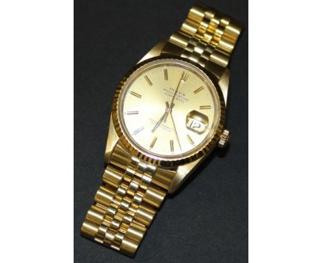 An 18ct yellow gold cased Rolex Oyster Perpetual Date Just Superlative Chronometer and bracelet gentleman's wristwatch, seria
