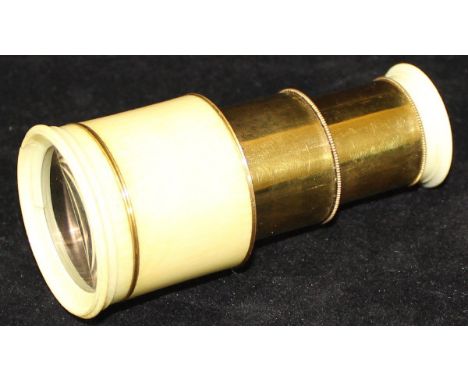 A 19th Century ivory bound three draw brass-lined telescope, inscribed "G. Adams London" to barrel, housed in a red Morroco l