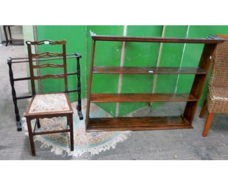 A dark stained pine and oak wall mounting three-tier open shelf unit, 130cm wide, a Chippendale style mahogany ladder-back be
