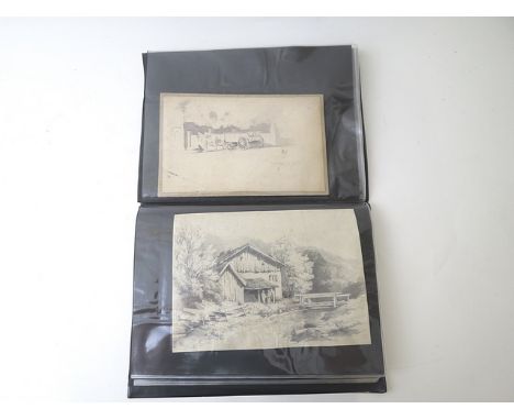 A collection of drawings, watercolours and signed engravings, mounted in an album to include a pen and ink drawing of machine