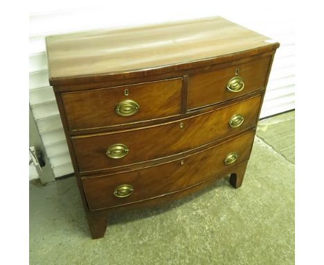 A Georgian mahogany bow fronted commode chest of two short and two long drawers, 3 1/4 x 32