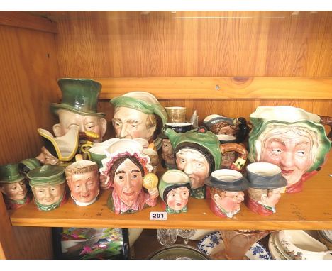 A collection of Beswick Dickens Character jugs (22)