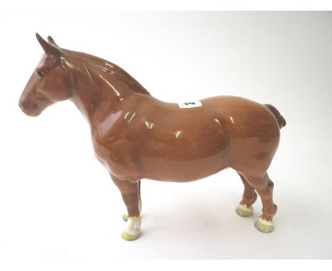 A Beswick model of a chestnut coloured Suffolk Punch horse with circular printed mark to base and further printed mark C H Ma