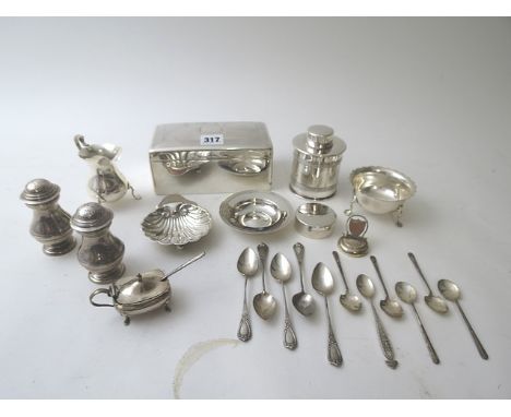 A selection of silver and silver plate to include a silver cigarette box, a matched pair of silver pepperettes with engraved 