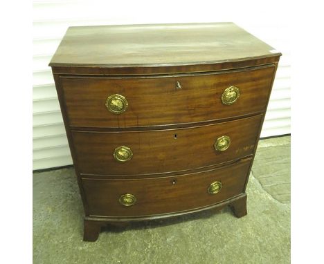 A Georgian mahogany bow fronted, three drawer commode chest of three long drawers, 33 1/2 x 31 1/2
