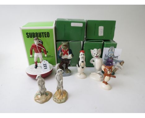 A Group of John Beswick, Wade and Royal Doulton figurines to include a Royal Doulton Subutteo Player, limited edition and box