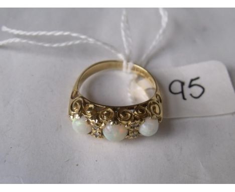 A good 18ct gold opal and diamond seven stone ring approx size 'K'        