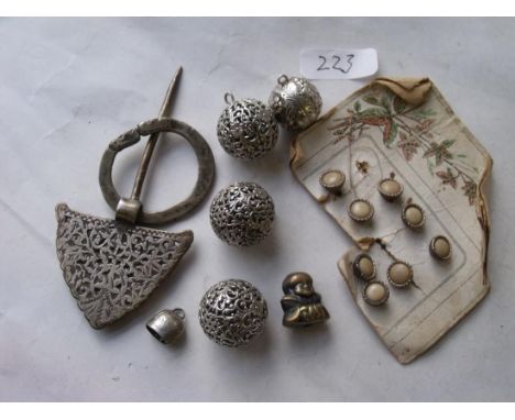 Bag containing cloak clasp and buttons etc    