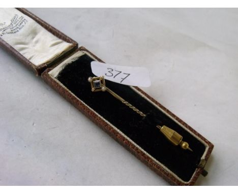 A boxed sapphire & pearl 15ct gold stick pin    