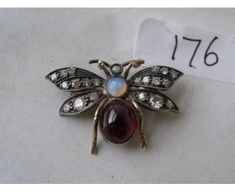 A GOOD DIAMOND, GARNET AND OPAL bug brooch set in gold 3cm wide      