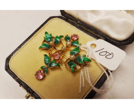 An unusual and attractive 9ct art nouveau brooch set with pink stones pearls and enamel 