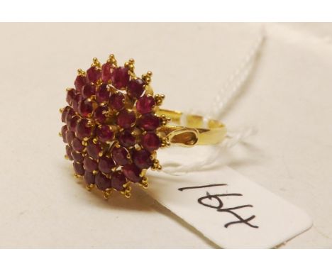 Unusual gold ruby set pyramid cluster ring 16mm dia approx size 'O'      