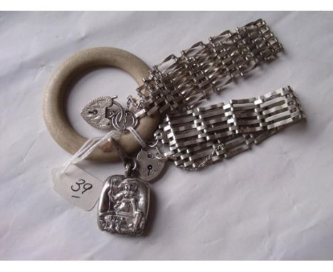 A Victorian silver child’s teething ring and two gate bracelets        