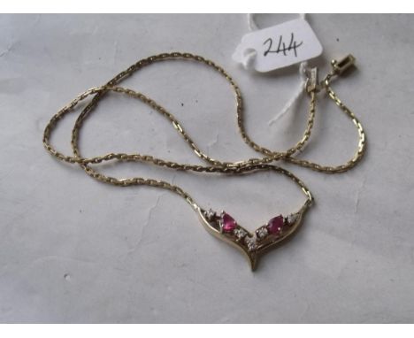 A ruby and diamond 9ct mounted necklace    