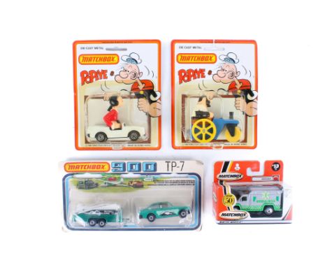 Four carded and boxed Matchbox diecast vehicles. Comprising two from the Popeye series, CS-14 Bluto's Road Roller and CS-15 O