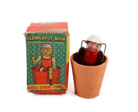 A Barrett & Sons for Luntoy Flowerpot man puppet. Early 1950s, the painted hollow-cast lead articulated figure with wire hand