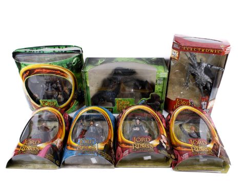Seven Toy Biz Lord of The Rings figures. Comprising a Deluxe Horse and Rider Set, Aragon, Moria Orc, King Theoden, Sauron, Gr