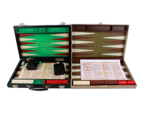 Two contemporary backgammon sets, both cased. With counters, one with dice and shakers.